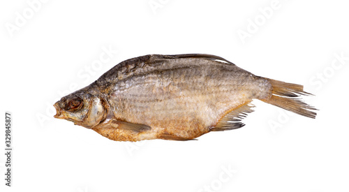 Salt-dried roach or vobla on white background close-up. Isolated.