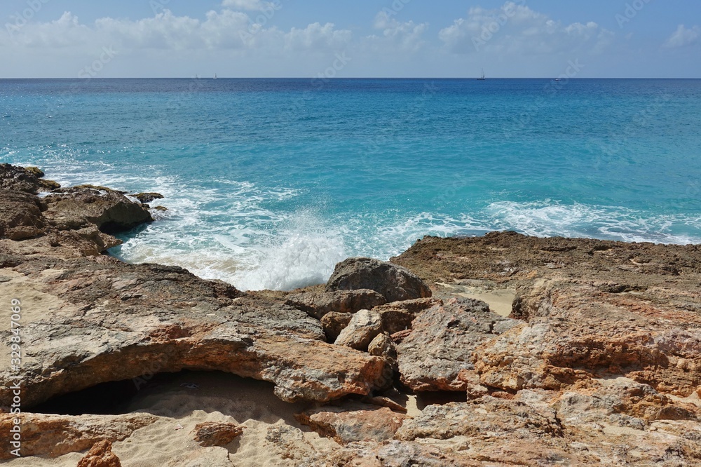 View of a beach on the blue Caribbean Sea in Saint Martin (Sint Maarten), Dutch Antilles