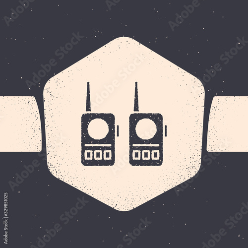 Grunge Walkie talkie icon isolated on grey background. Portable radio transmitter icon. Radio transceiver sign. Monochrome vintage drawing. Vector Illustration