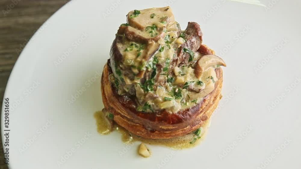 top view zoom out from mushroom julienne spins around on plate top view zoom out from mushroom julienne spins around on plate