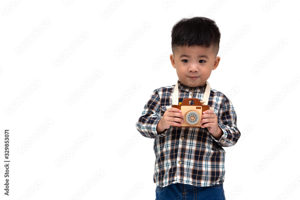 Attractive Asian little boy photographer wearing striped shirt standing isolated over white background, Taking a picture with toy photo camera, Two year one month old Attractive Asian little boy photographer wearing striped shirt standing isolated over white background, Taking a picture with toy photo camera, Two year one month old