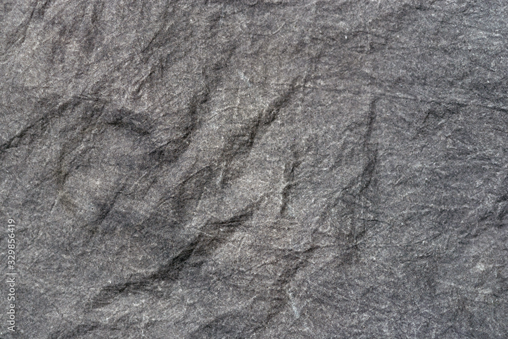Crumpled fabric texture, dark gray cloth background. Copy space Crumpled fabric texture, dark gray cloth background. Copy space