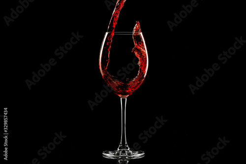 Red wine splash over dark background
