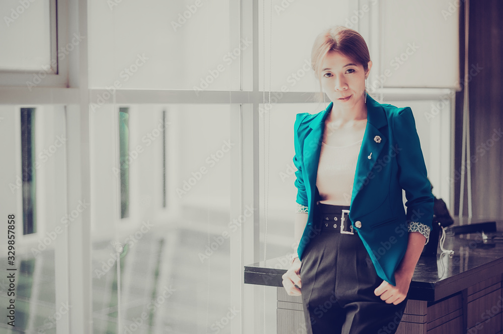 Professional businesswoman poses in smartoffice,Technical Support Service Business, Comfortable work place Concept. Professional businesswoman poses in smartoffice,Technical Support Service Business, Comfortable work place Concept.