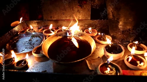 Candles close-up in the Indian Temple on a Religious Festival Diwali. Oil Lamp