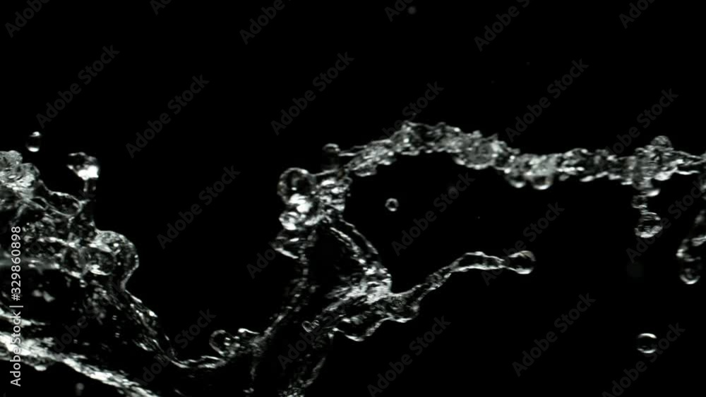 Super slow motion of splashing water rotation isolated on black background. Filmed on very high speed camera, 1000 fps. Super slow motion of splashing water rotation isolated on black background. Filmed on very high speed camera, 1000 fps.