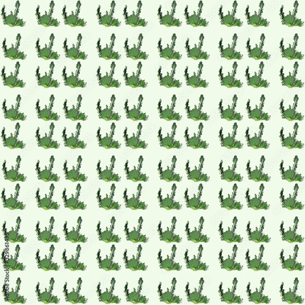 Seamless broccoli pattern on a green background.