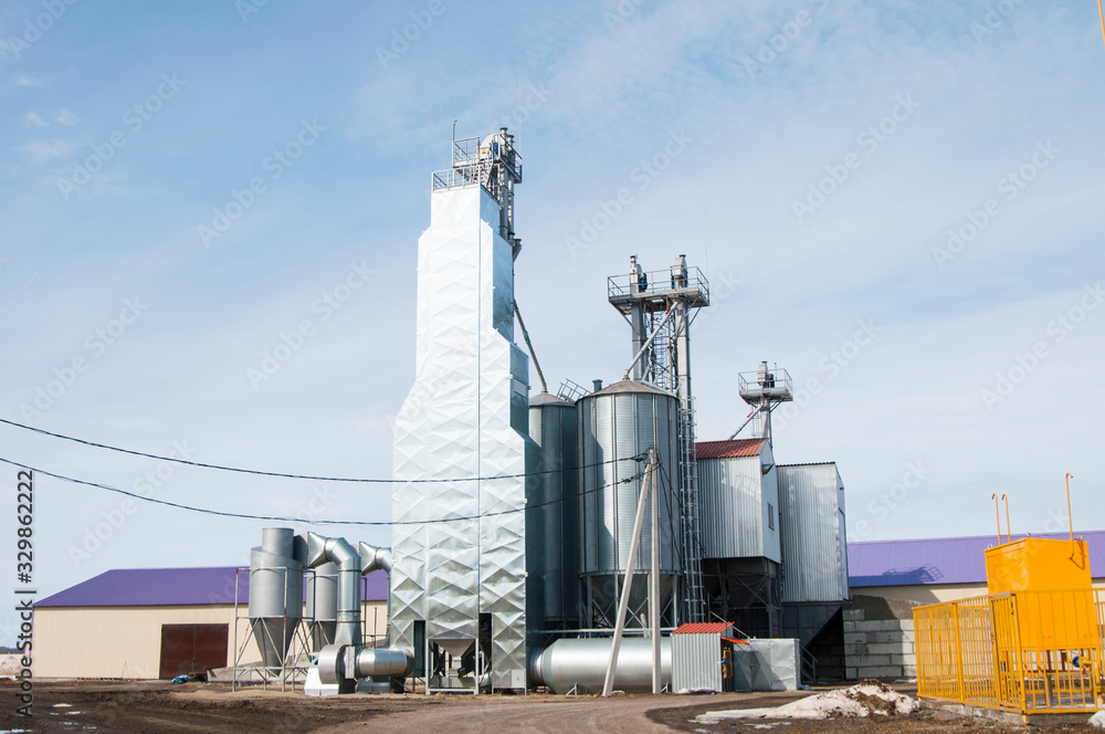 Obraz premium Elevator, grain storage. Metal agricultural building.