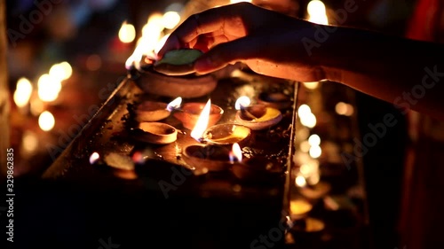 Candles close-up in the Indian Temple on a Religious Festival Diwali. Oil Lamp