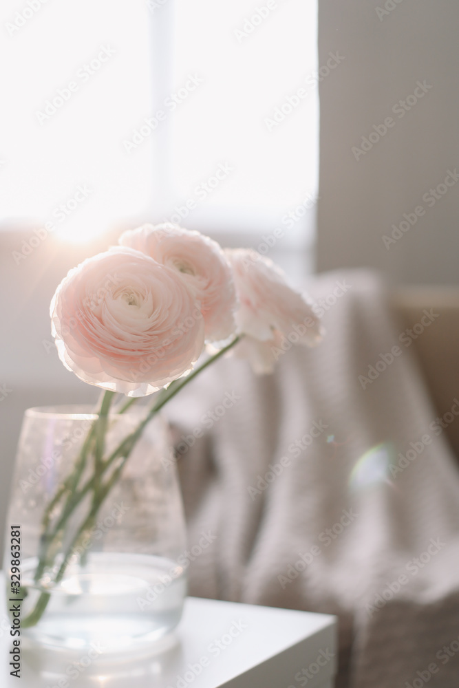 Bunch of fresh flowers in vase on table. Interior decor. Spring wallpaper. Wedding or birthday greeting cards and invitations. Bunch of fresh flowers in vase on table. Interior decor. Spring wallpaper. Wedding or birthday greeting cards and invitations.