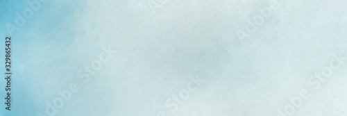 vintage abstract painted background with light gray, sky blue and light blue colors and space for text or image. can be used as horizontal background graphic