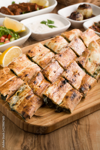 turkish meat pide on wooden table