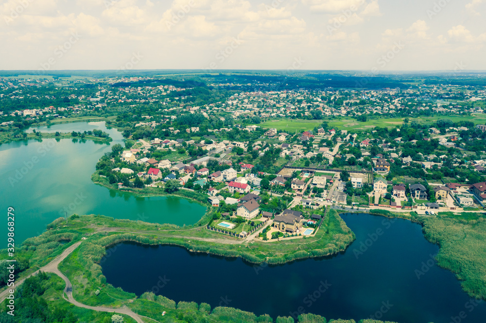 Aeirial view village with lake from high