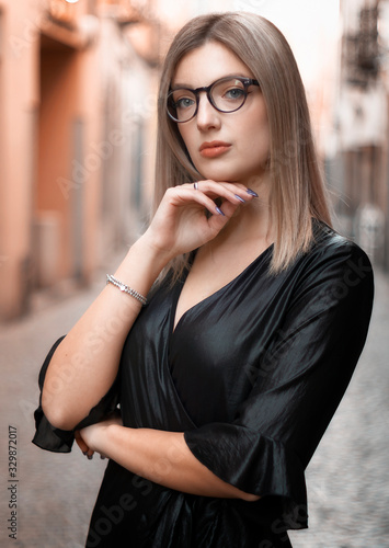 Portrait of a blonde with glasses