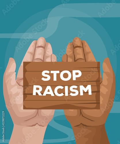 interracial hands with wooden label stop racism campaign