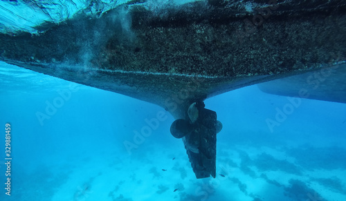 Ship propeller underwater, close up