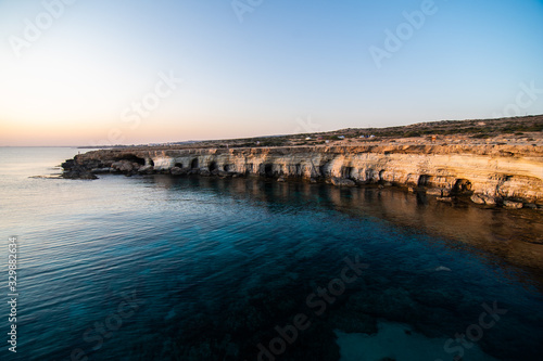 Blue lagoon in the Mediterranean on sunset, Cyprus cave photo