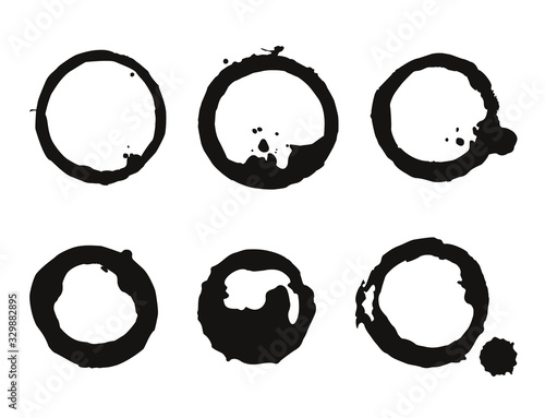 Isolated black blots set from coffee or tea. Vector illustration of coffee cup stains. Collection vector stains silhouette of coffee for grunge design