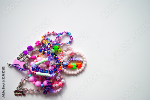 bead bracelets. beads. decorations. bijouterie. hobbies of girls. background