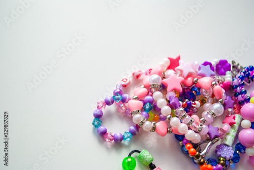 bead bracelets. beads. decorations. bijouterie. hobbies of girls. background