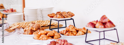 Fotografie Pastry buffet served at charity event, sweet food and dessert table