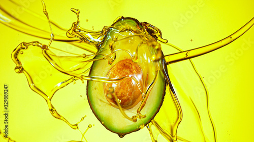 Fresh cut avocado with oil ...