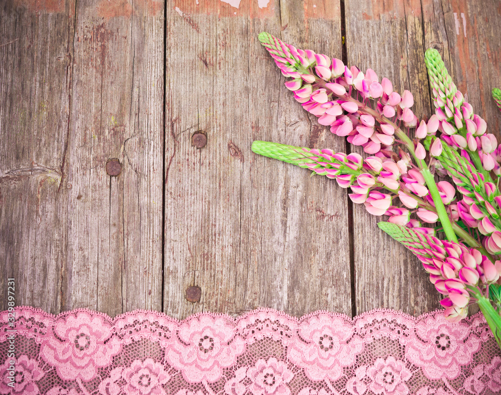 custom made wallpaper toronto digitalWildflowers bouquet. Pink Lupine flowers and lace on old shabby wooden table. Vintage floral background.