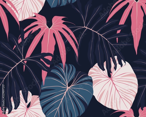 Naklejka Abstract vintage colors seamless tropical pattern with colorful pink blue leaves on dark background. Seamless exotic pattern with tropical plants. Exotic wallpaper. 
