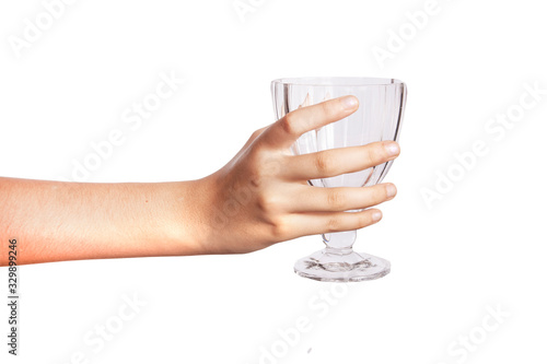A woman is holding a hand and a glass on a white background
