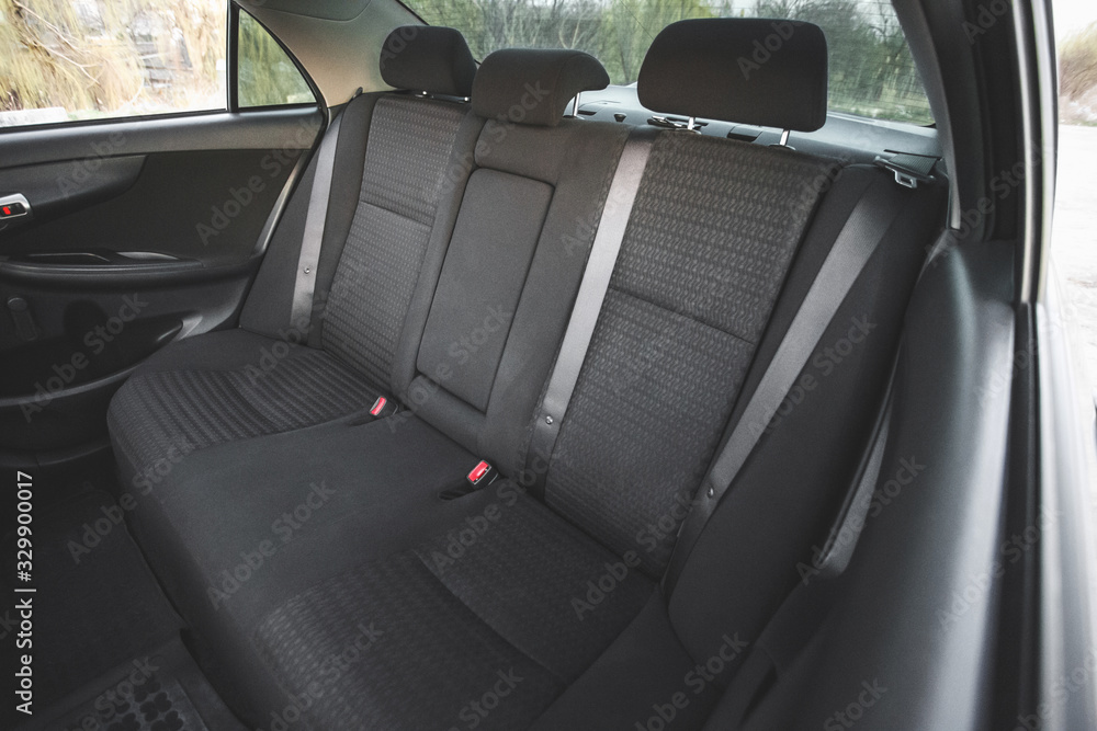 Car interior, part of back seats, close Car interior, part of back seats, close