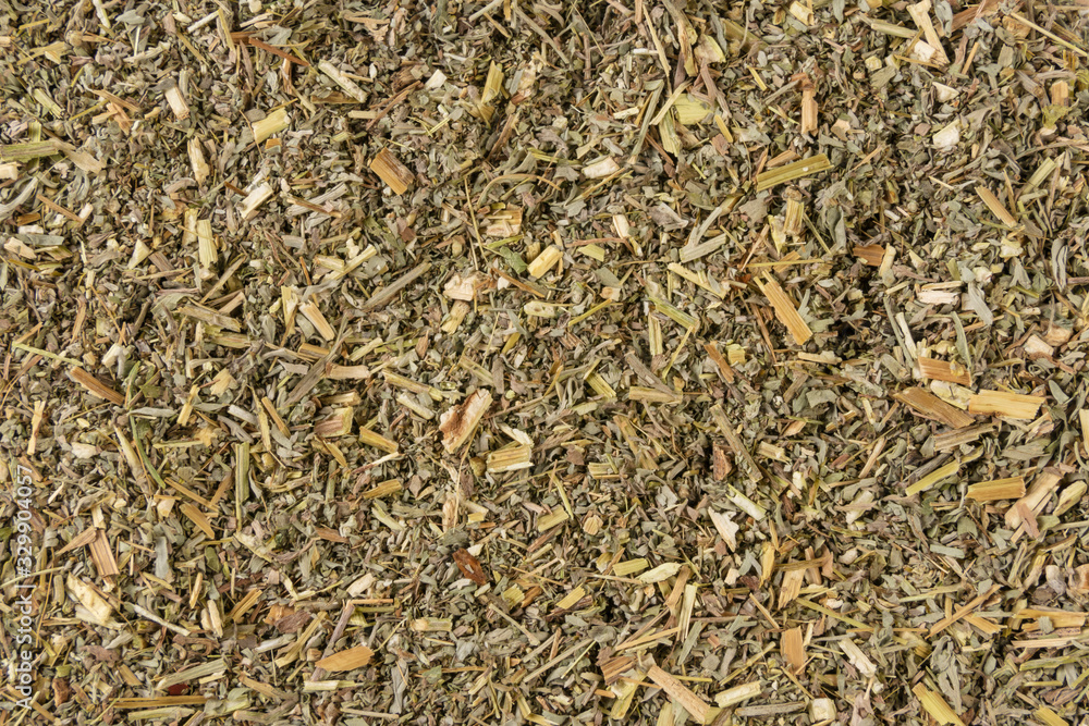 wormwood herb or in latin Absinthii herba herb background. medicinal healing herbs. herbal medicine. alternative medicine wormwood herb or in latin Absinthii herba herb background. medicinal healing herbs. herbal medicine. alternative medicine