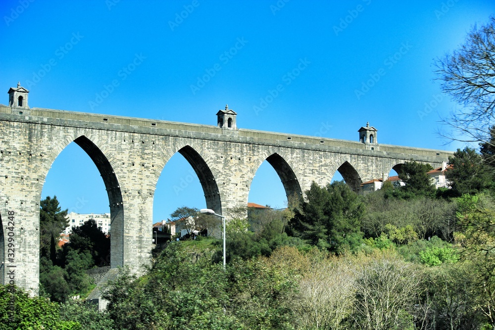 Beautiful stone aqueduct called Aguas Livres in Lisbon