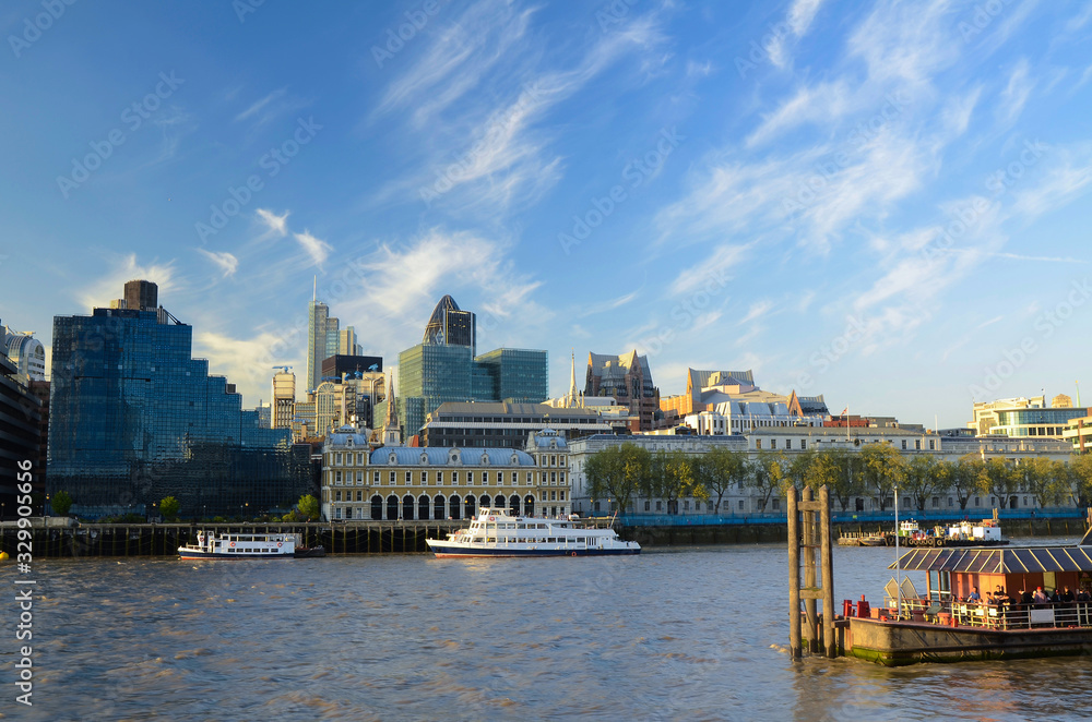 View of Billingsgate Market and city skyline from the south bank of the River Thames
