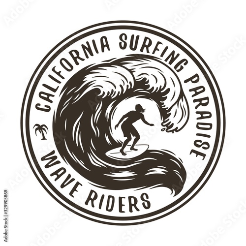 Silhouette of a man on a wave on surfing board