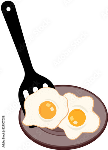 Putting fried eggs on the plate