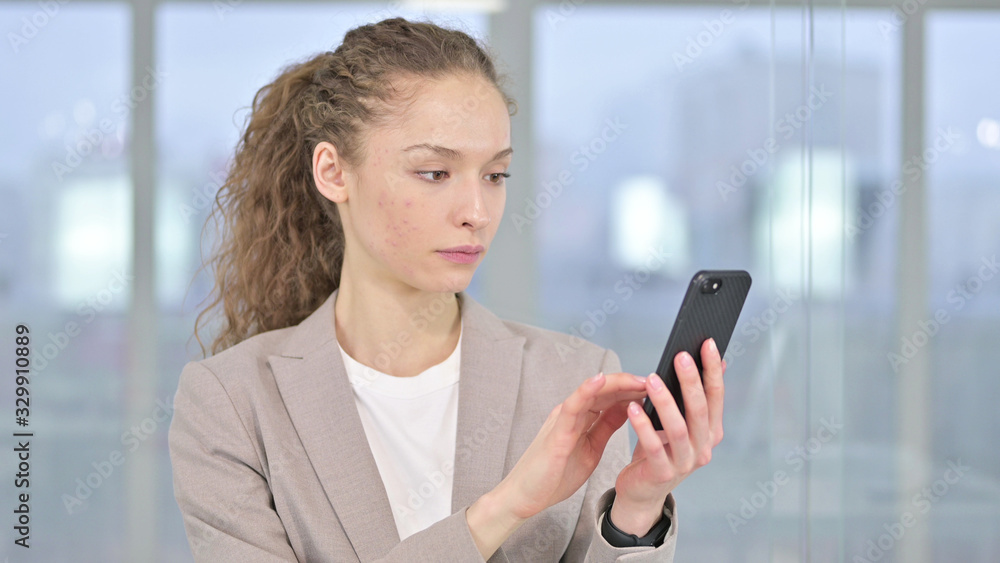 Portrait of Young Businesswoman using Smartphone Portrait of Young Businesswoman using Smartphone