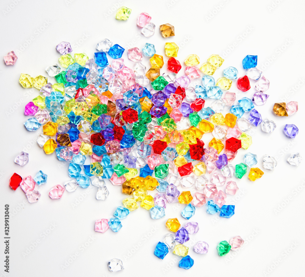Multicolored gemstones on a white background