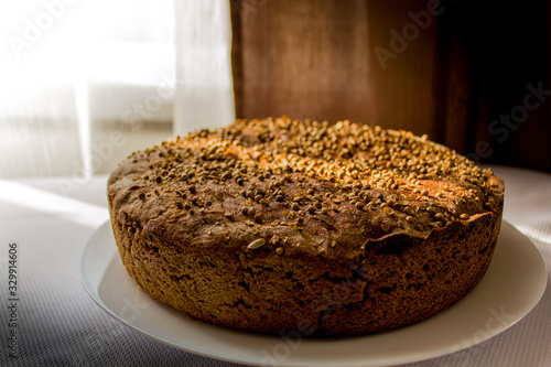 handmade black bread on a white plate