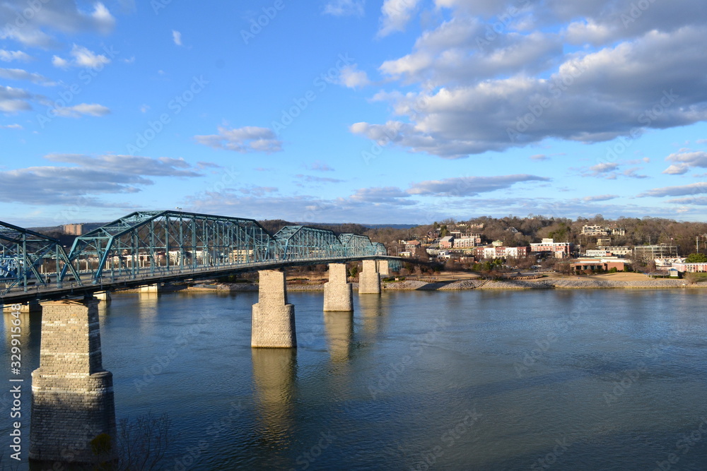 Great View Of The Walnut Street Bridge In Chattanooga, Tennessee On A Sunny Day With Clouds In Sky