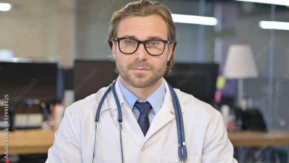 Portrait of Serious Doctor looking at Camera Portrait of Serious Doctor looking at Camera