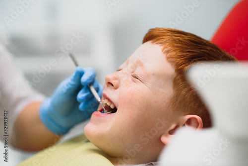 Female dentist and child in a dentist office