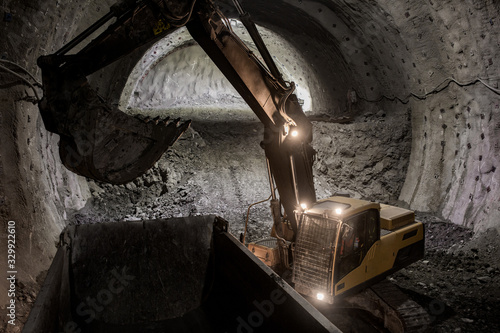 digger working in tunnel