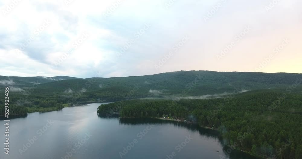 Beautiful mountain lake Turgoyak at sunset aerial Beautiful mountain lake Turgoyak at sunset aerial