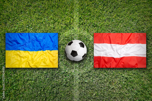 Ukraine vs. Austria flags on soccer field