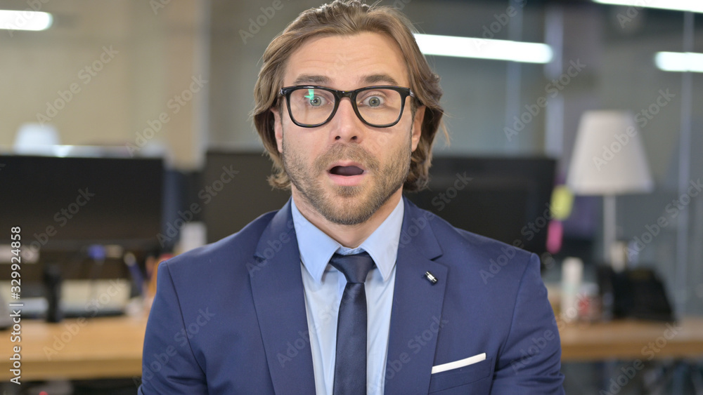 Portrait of Upset Businessman getting Disappointed by Loss Portrait of Upset Businessman getting Disappointed by Loss