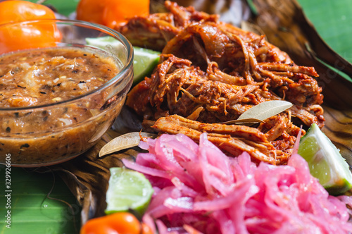 Cochinita Pibil, Served With Yucatecan Habanero Sauce And Pickled Onions photo