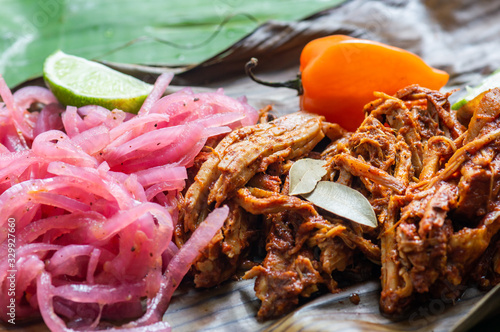 Cochinita Pibil, Served With Yucatecan Habanero Sauce And Pickled Onions photo