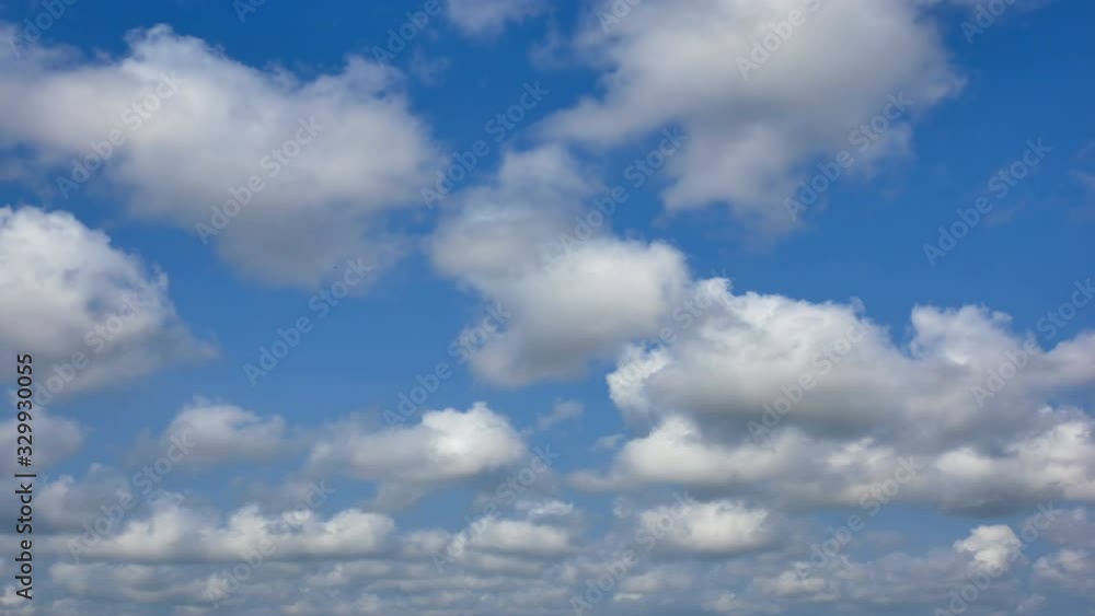 Time lapse blue sky clouds space weather. Clouds weather rolling puffy moving. Time lapse blue sky clouds space weather. Clouds weather rolling puffy moving.