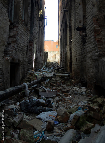 The ruins of an old brick abandoned house look like after the bombing