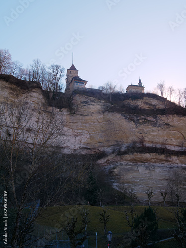 The Bourguillon Gate and Loreto chapel in Fribourg, Switzerland seen from the Central Bridge, located at the base of the precipice. photo